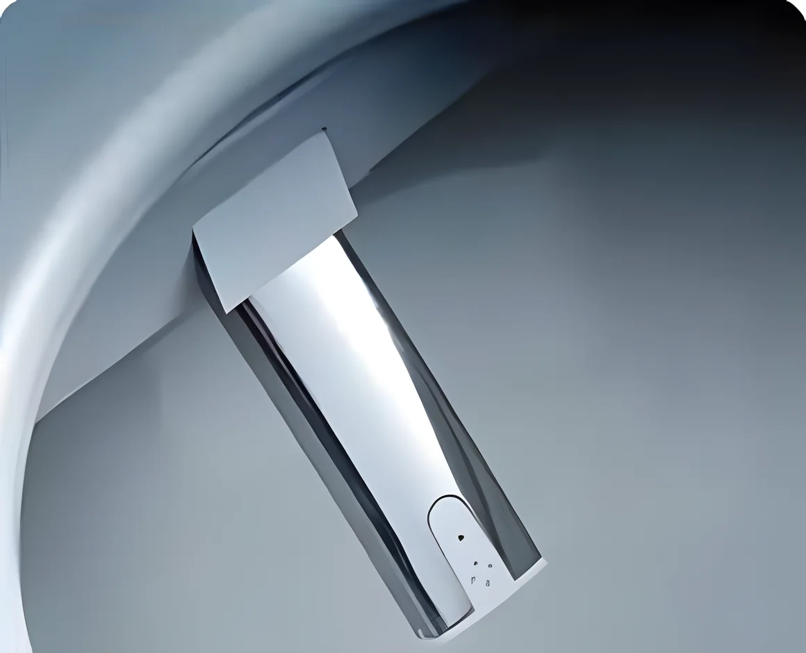 The stainless wash wand extending under the seat